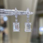 Emerald cut sunflower diamond earrings stud