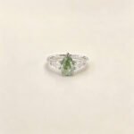 Pear cut lab grown diamond three stones engagement ring