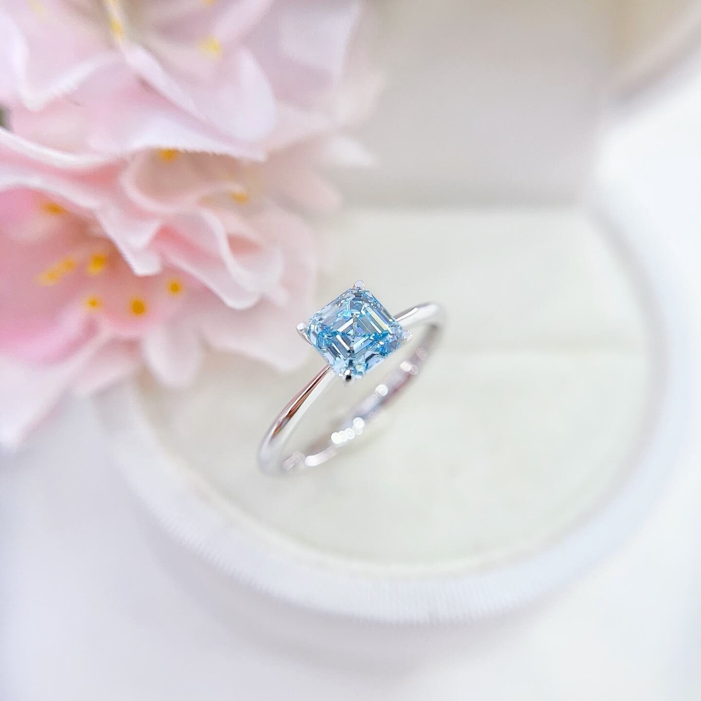 Asscher cut lab grown blue diamond engagement ring
