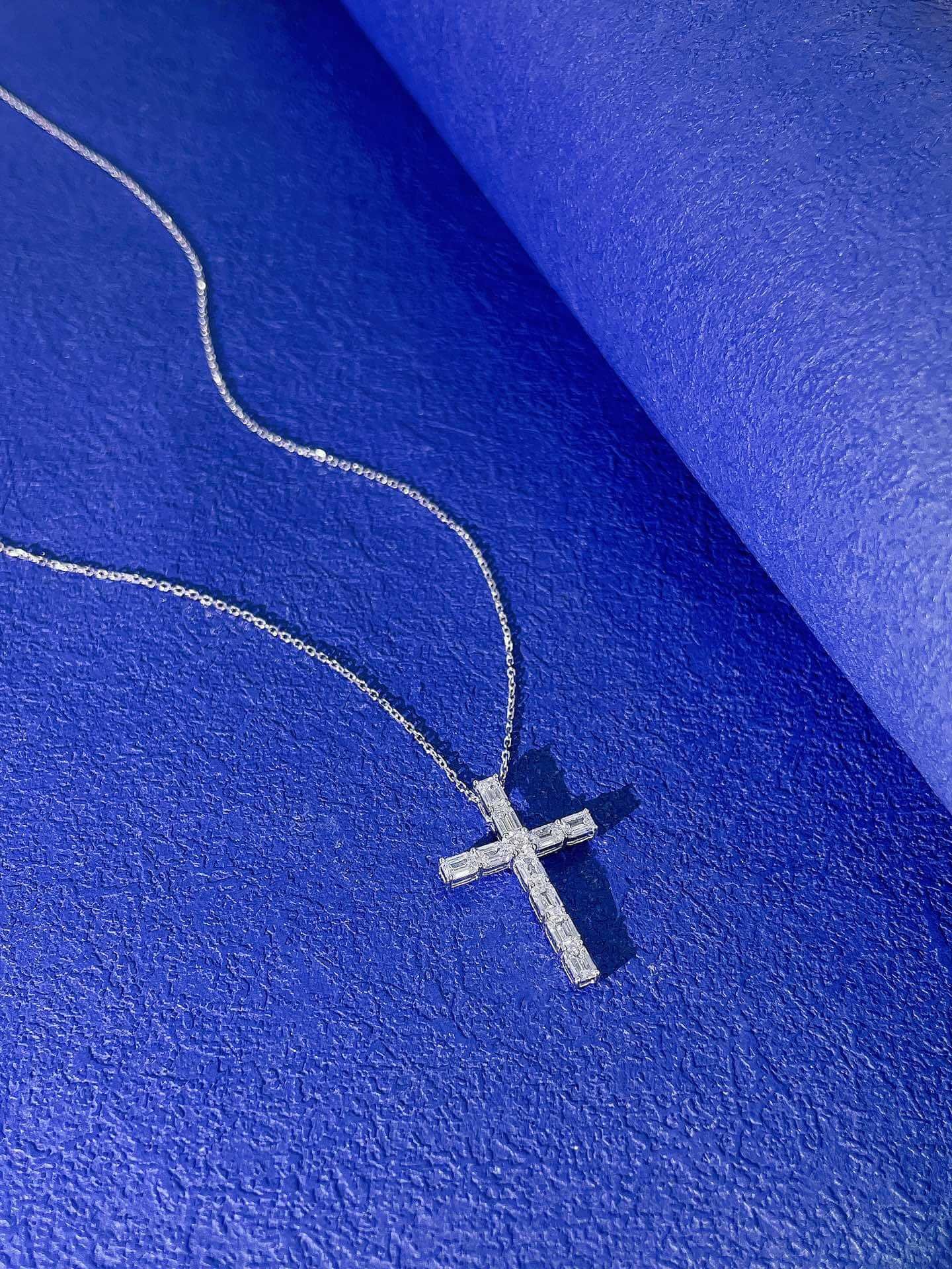 Emerald cut lab grown diamond cross pendant necklace
