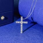 Emerald cut lab grown diamond cross pendant necklace