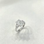 Emerald cut lab grown diamond three stones engagement ring