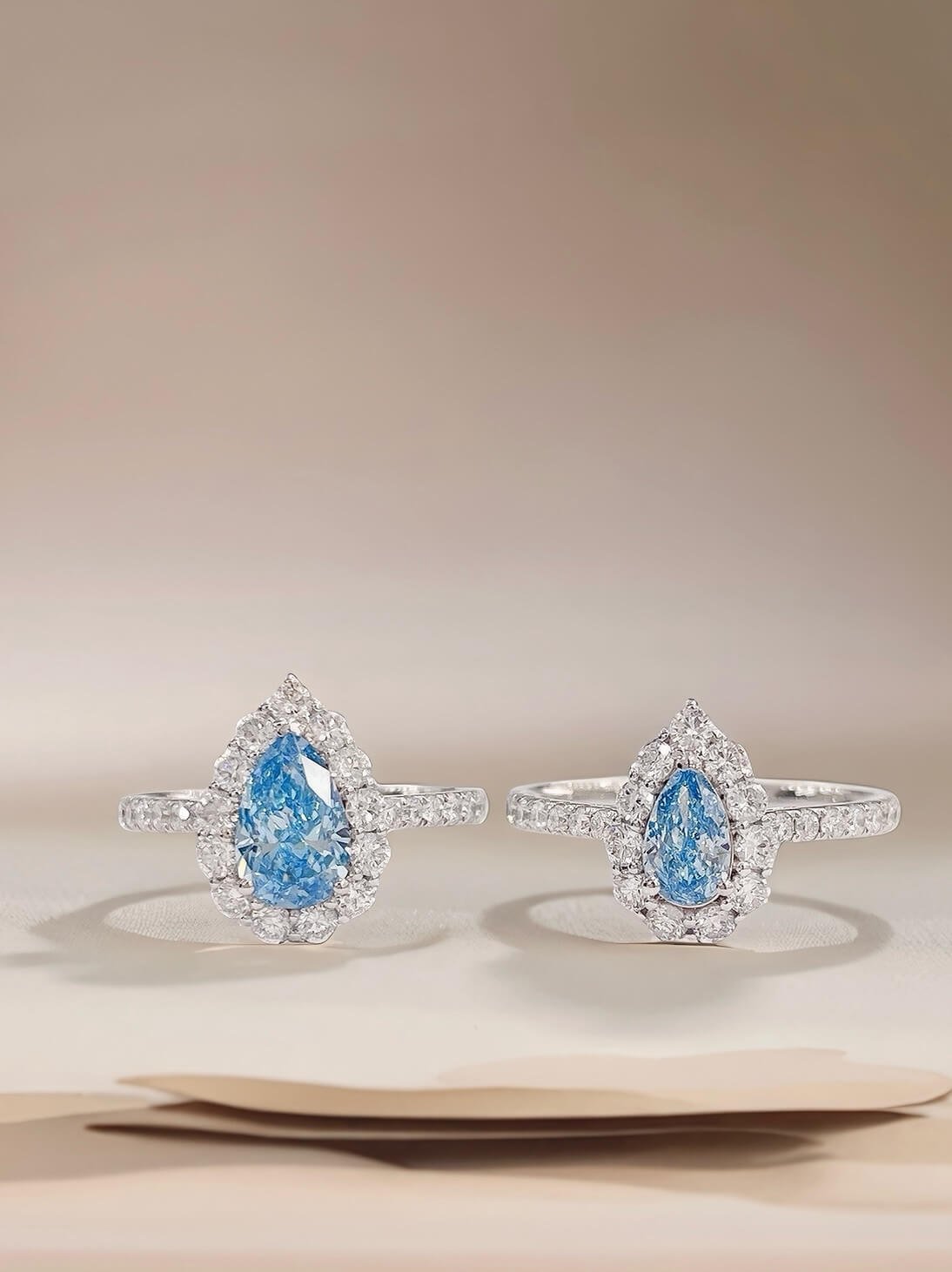 Halo setting pear cut lab grown blue diamond engagment ring Halo setting pear cut lab grown blue diamond engagment ring