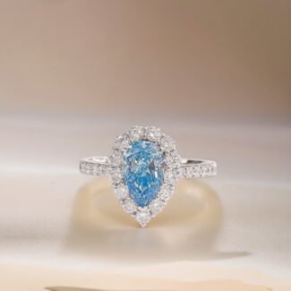 Halo setting pear cut lab grown blue diamond engagment ring