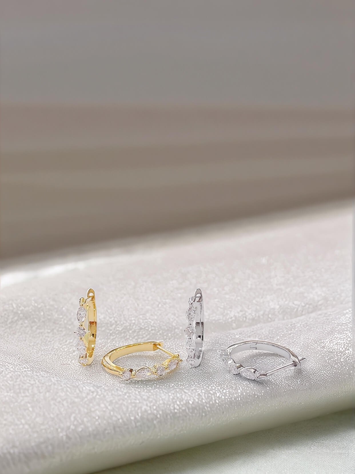 Marquise and round cut lab grown diamond hoop earrings Marquise and round cut lab grown diamond hoop earrings