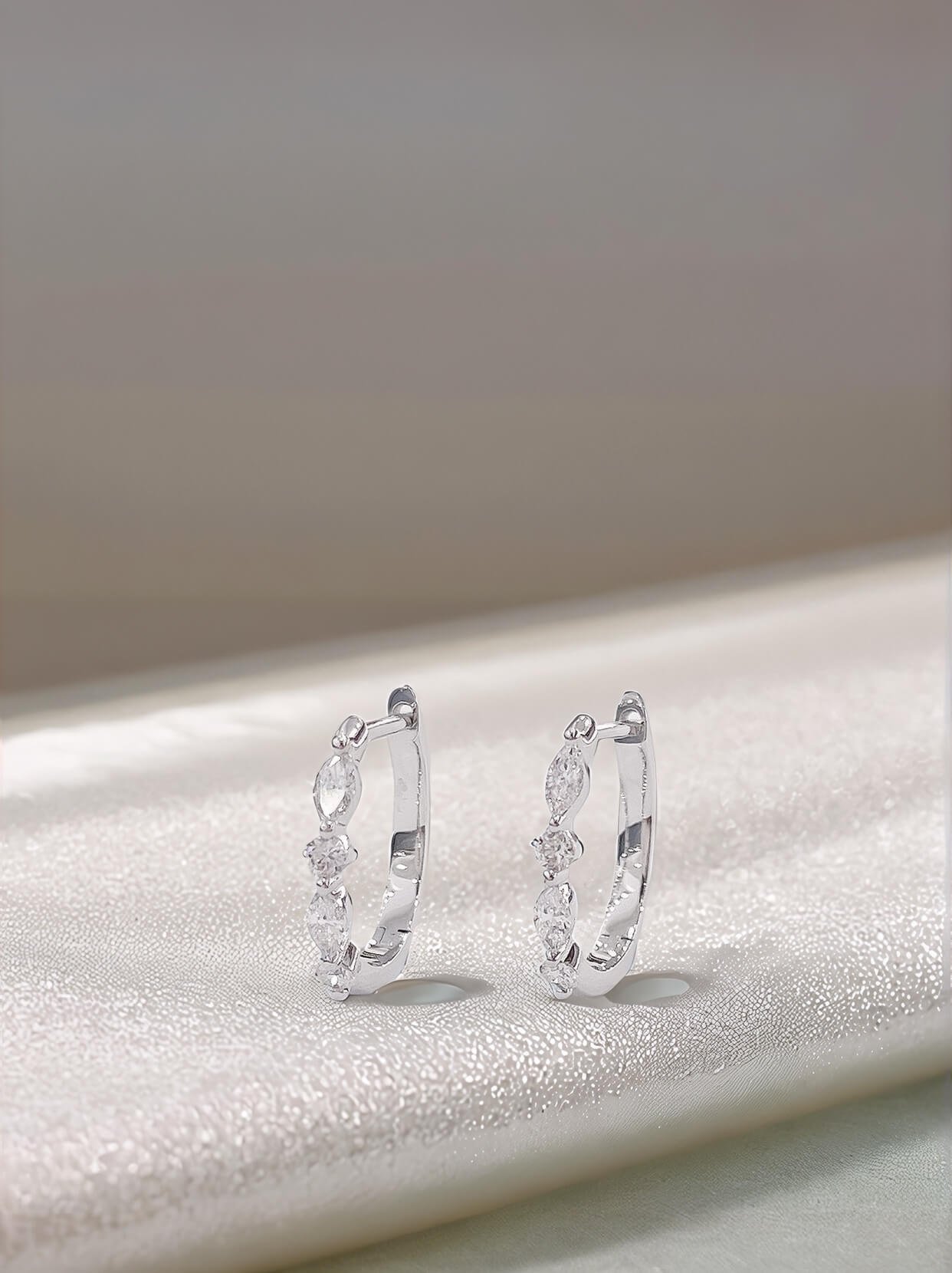 Marquise and round cut lab grown diamond hoop earrings Marquise and round cut lab grown diamond hoop earrings