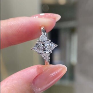 Marquise cut lab grown diamond three stones engagement ring