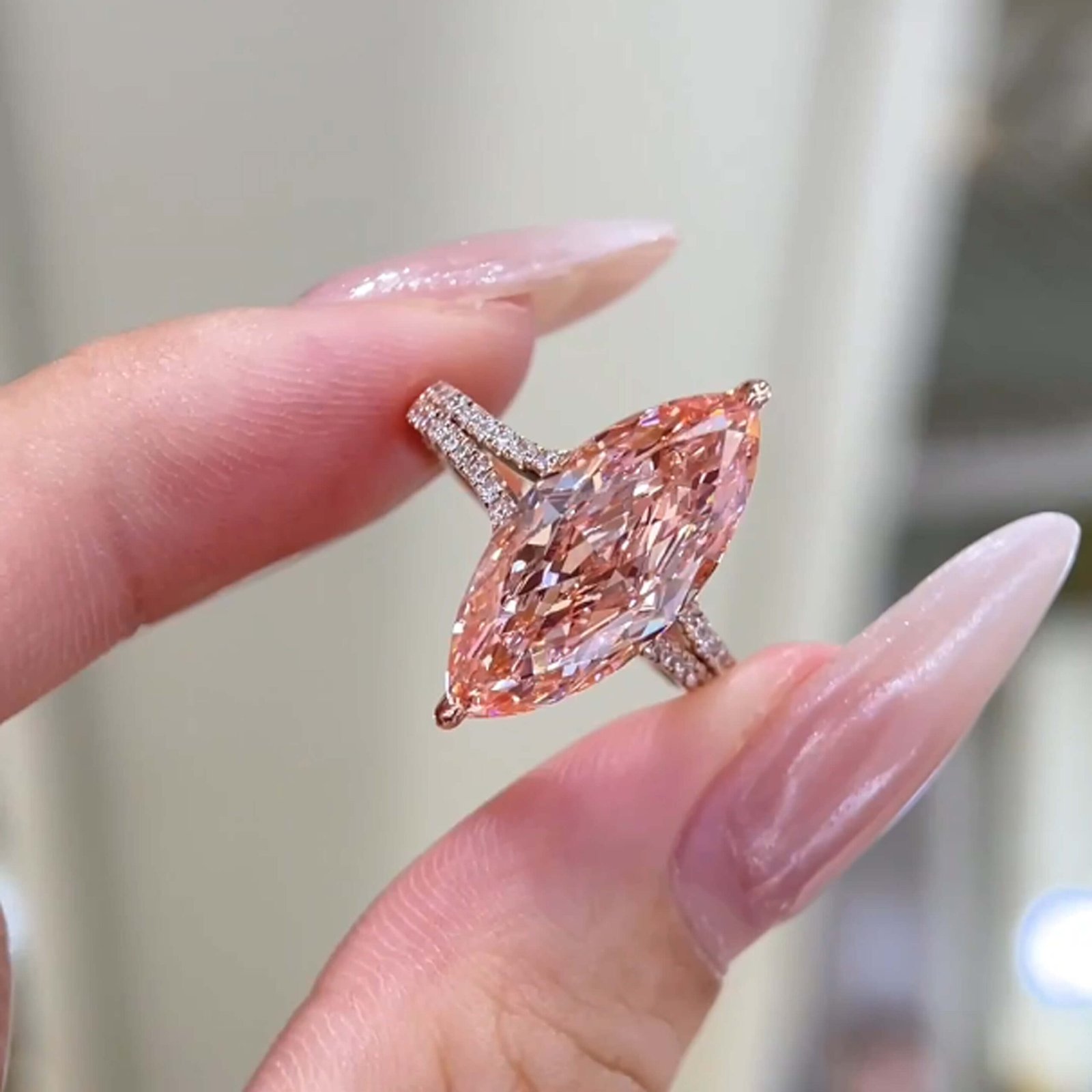 Marquise cut lab grown pink diamond engagement ring