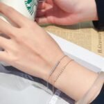Nine round cut lab grown diamond bracelet