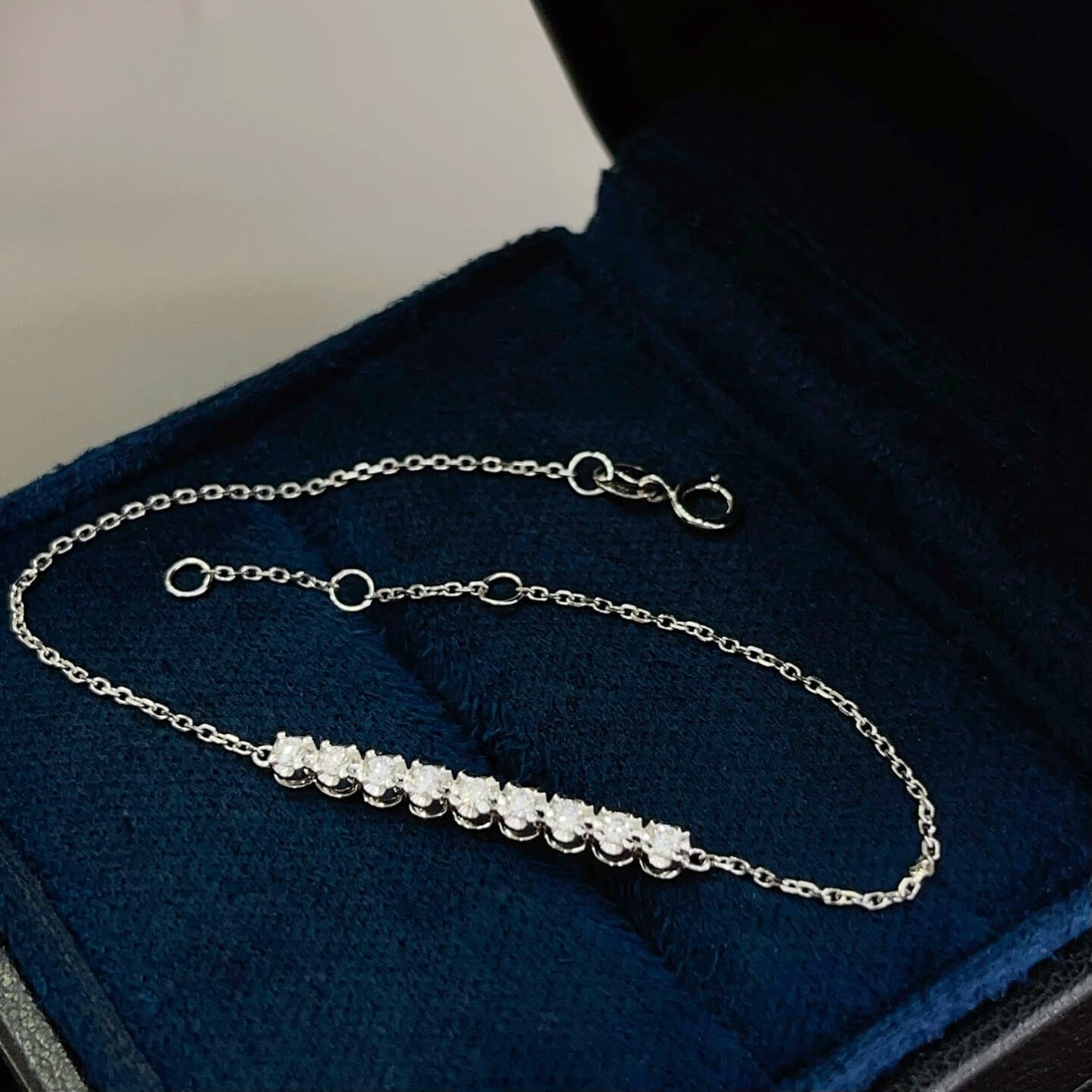 Nine round cut lab grown diamond bracelet