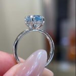 Oval cut lab grown blue diamond engagement ring