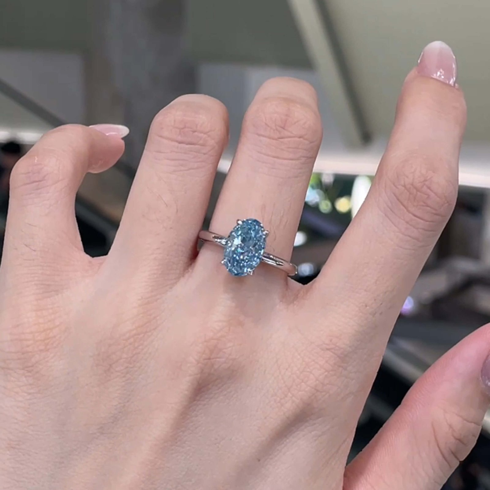 Oval cut lab grown blue diamond engagement ring Oval cut lab grown blue diamond engagement ring