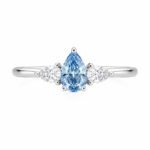 Pear cut lab grown blue diamond three stones engagement ring