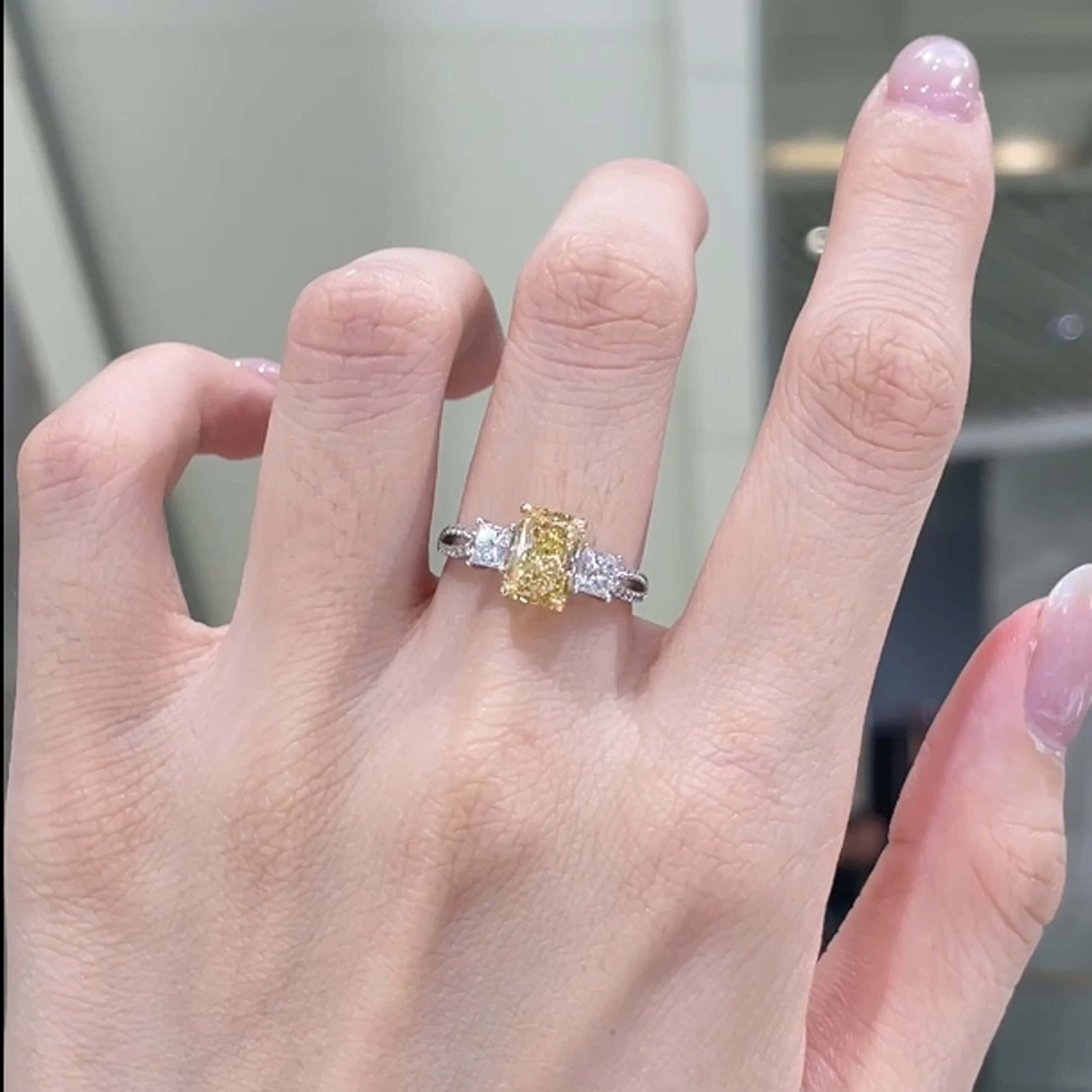 Radiant cut lab grown yellow diamond three stones engagement ring