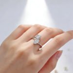 Round and pear cut lab grown diamond engagement ring