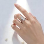 Round and pear cut lab grown diamond engagement ring