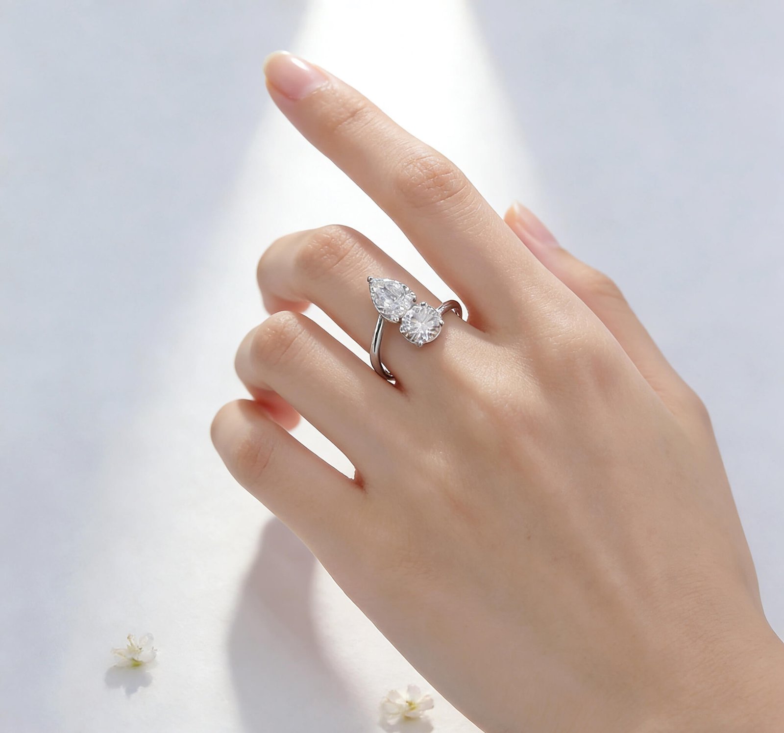 Round and pear cut lab grown diamond engagement ring Round and pear cut lab grown diamond engagement ring