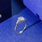 Round cut lab grown diamond three stones engagement ring