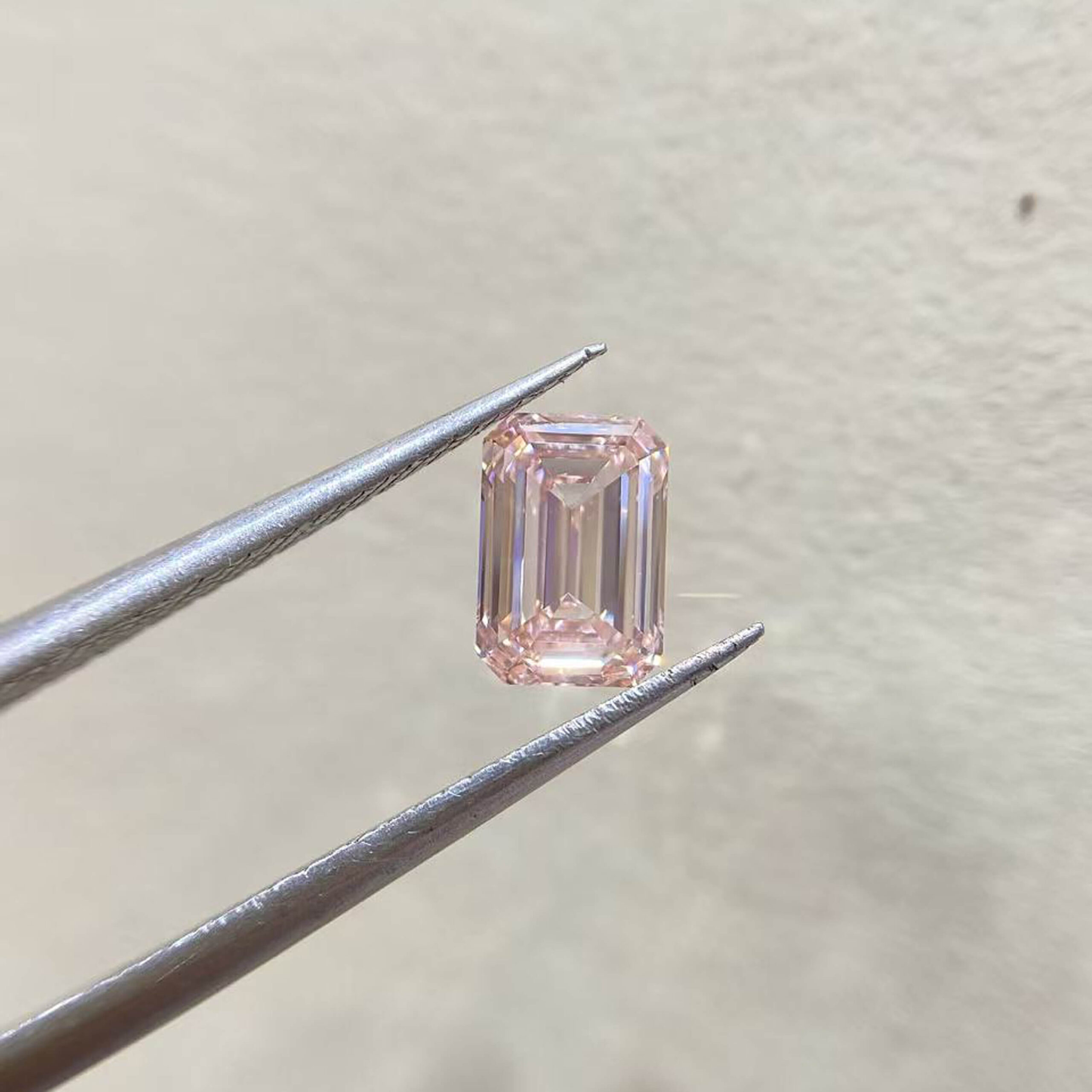 1.01ct emerald cut fancy intense pink lab grown diamond