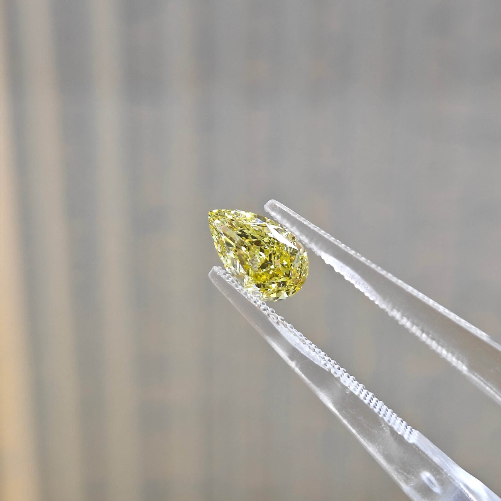 1.01ct pear cut fancy intense yellow lab grown diamond