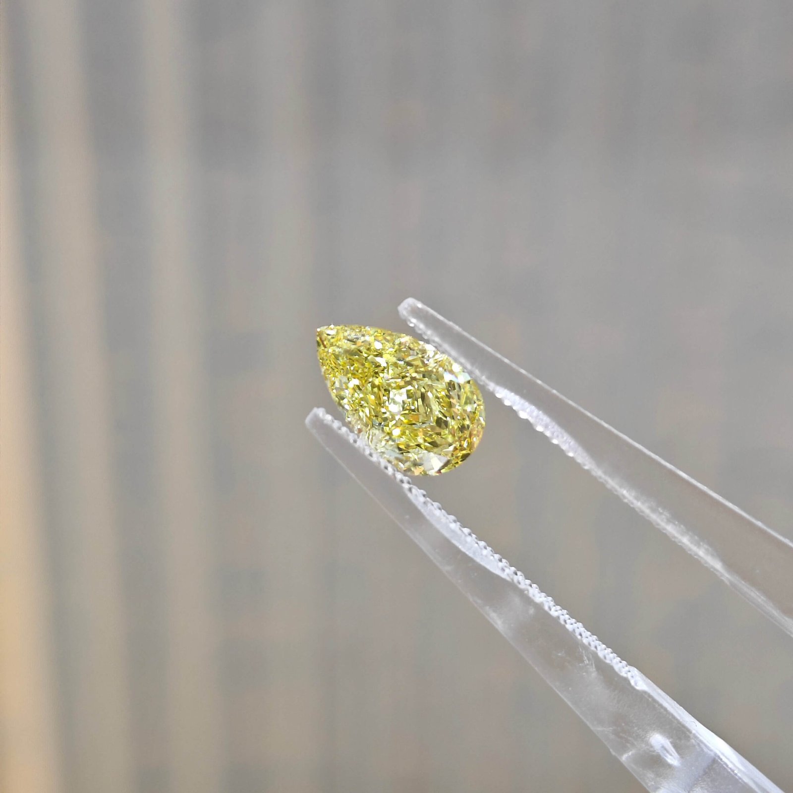 1.05ct pear cut fancy intense yellow lab grown diamond