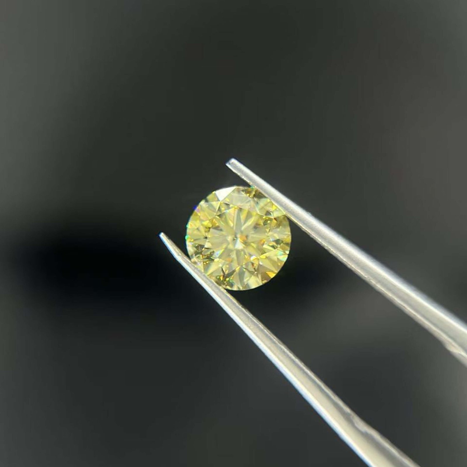 1.08ct round cut fancy intense yellow lab grown diamond