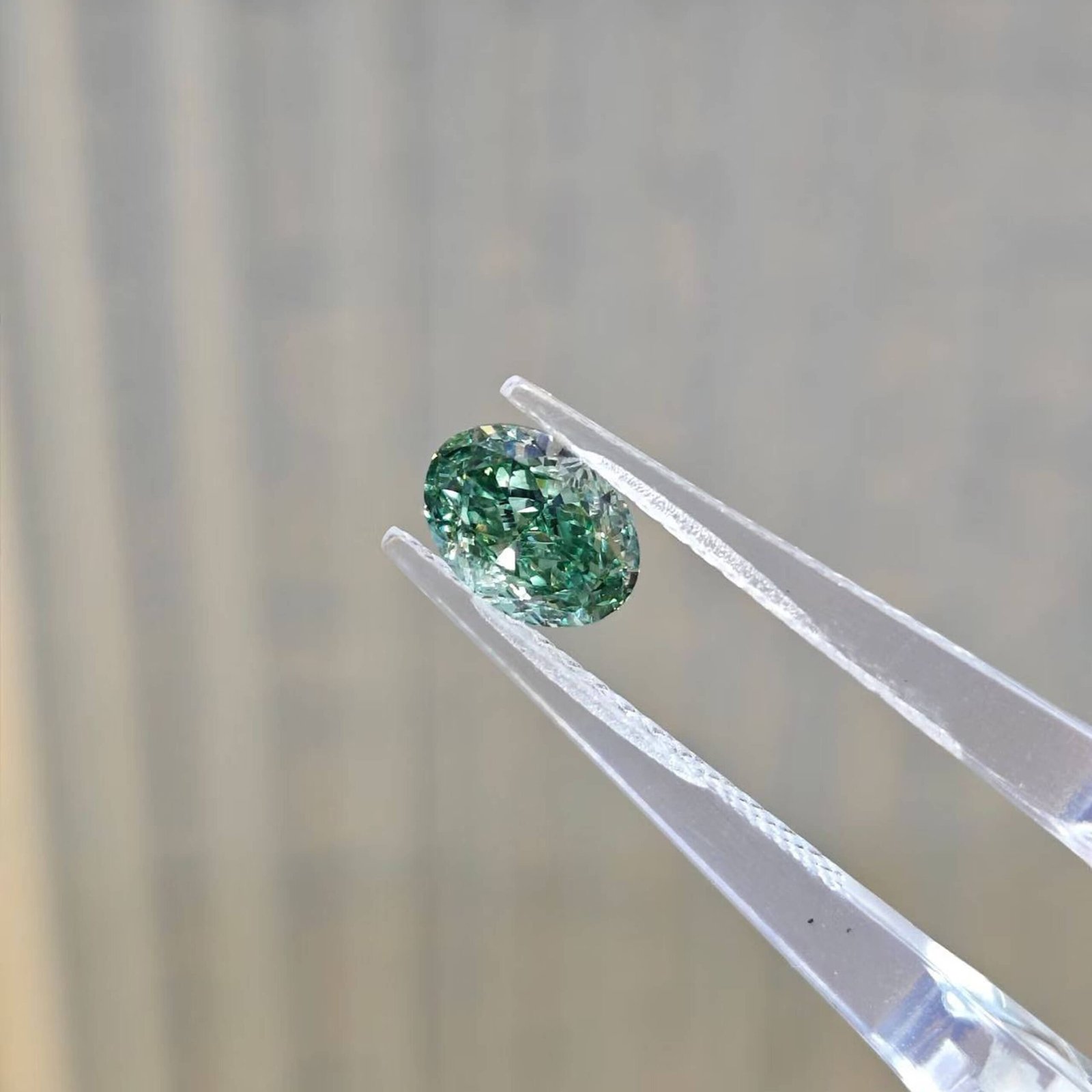 1.10ct oval cut fancy intense green lab grown diamond