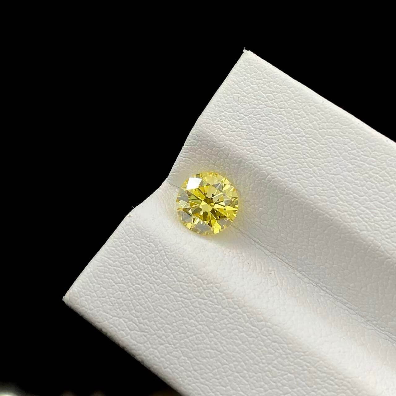 1.15ct round cut fancy intense yellow lab grown diamond