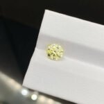 1.30ct round cut fancy yellow lab grown diamond