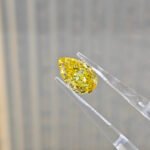3.06ct pear cut fancy vivid yellow lab grown diamond