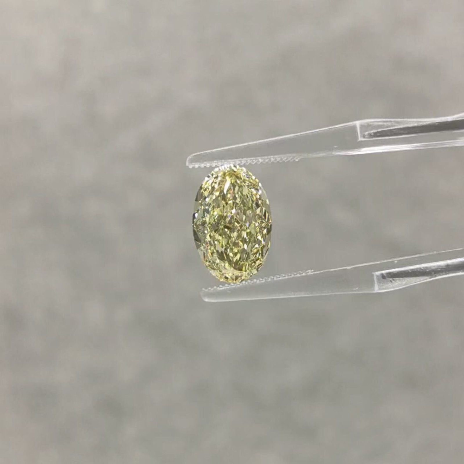 4.10ct oval cut fancy intense yellow lab grown diamond