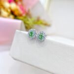 Halo setting oval cut lab grown green diamond earrings stud
