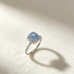 Cushion cut lab grown blue diamond engagement ring