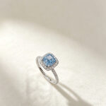 Cushion cut lab grown blue diamond engagement ring