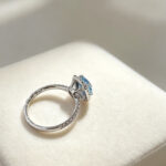 Cushion cut lab grown blue diamond engagement ring