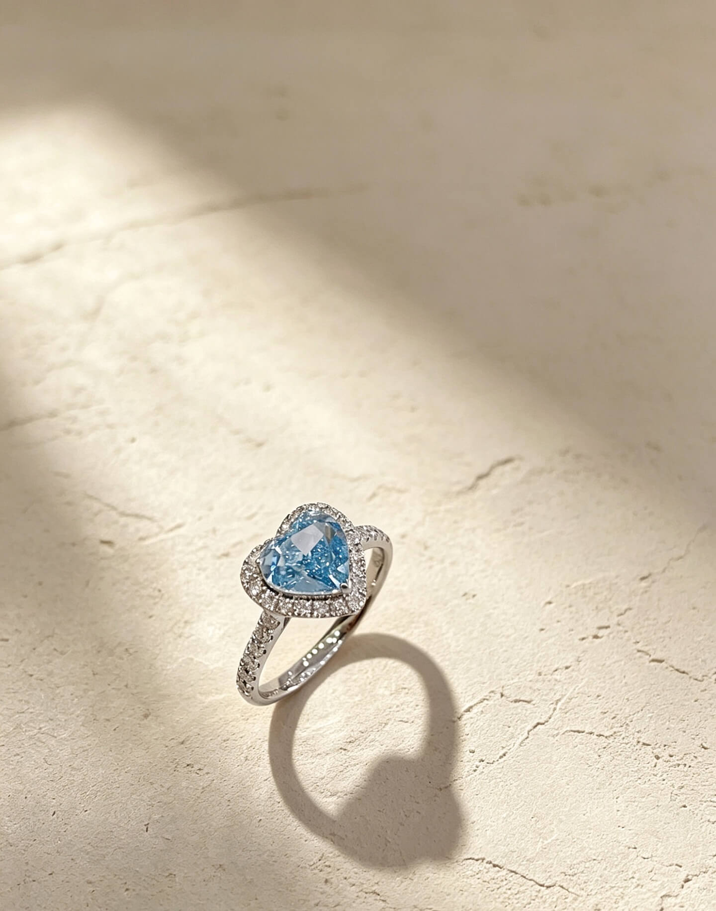 Heart cut lab grown blue diamond engagement ring