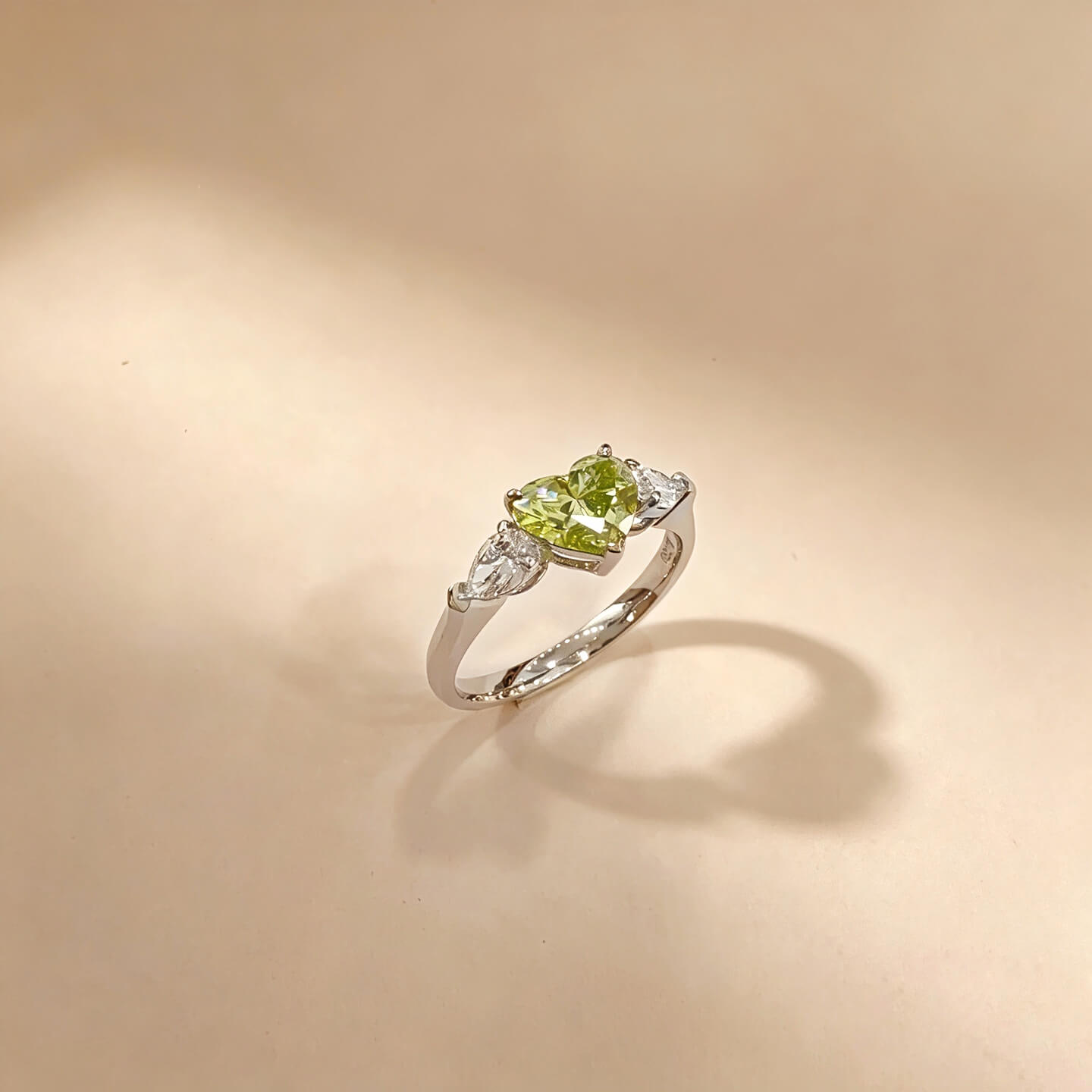 Heart cut lab grown green diamond three stones engagement ring