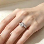 Oval cut lab grown diamond three stones engagement ring
