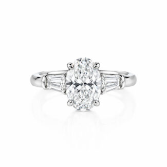 Oval cut lab grown diamond three stones engagement ring