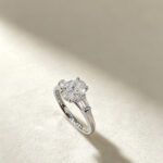 Oval cut lab grown diamond three stones engagement ring