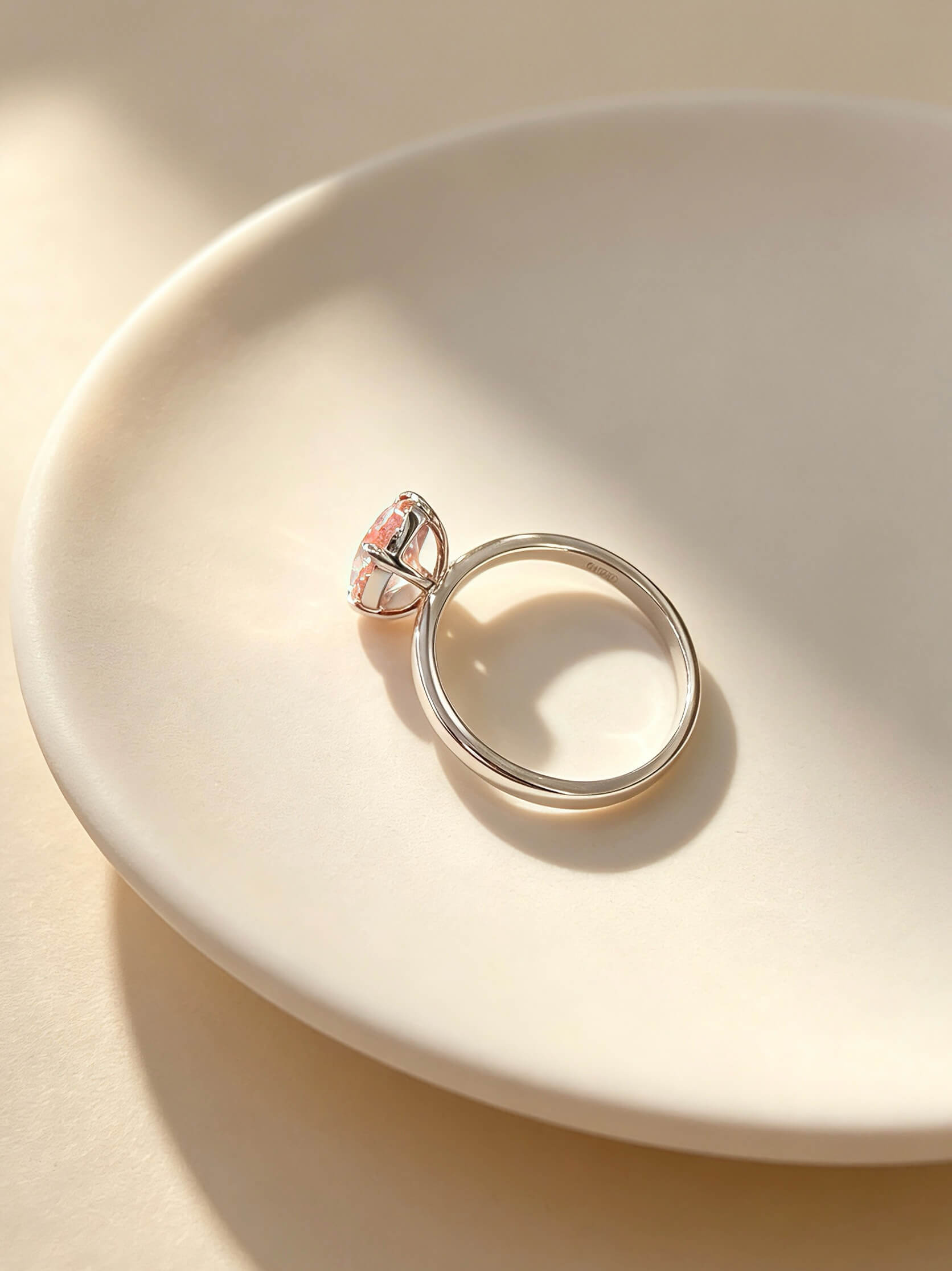 Oval cut lab grown pink diamond engagement ring 01