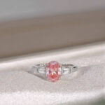 Oval cut lab grown pink diamond three stones engagement ring 02