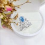 Pear cut lab grown blue diamond engagement ring 01