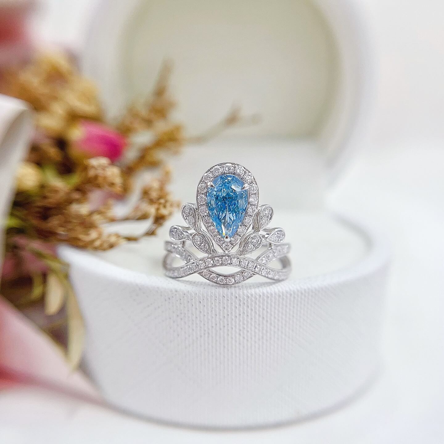 Pear cut lab grown blue diamond engagement ring 01