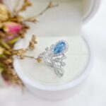 Pear cut lab grown blue diamond engagement ring 01