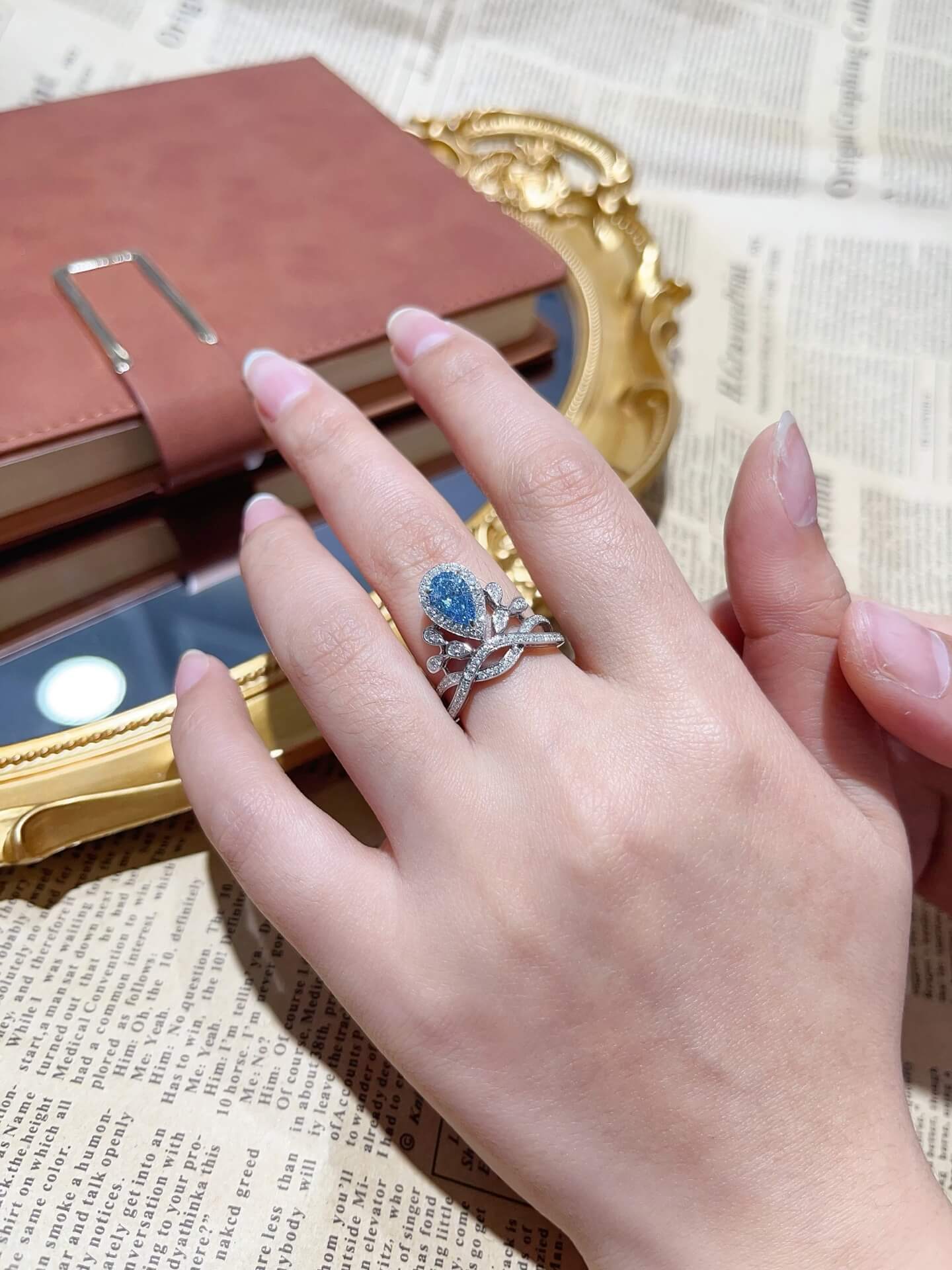 Pear cut lab grown blue diamond engagement ring 01