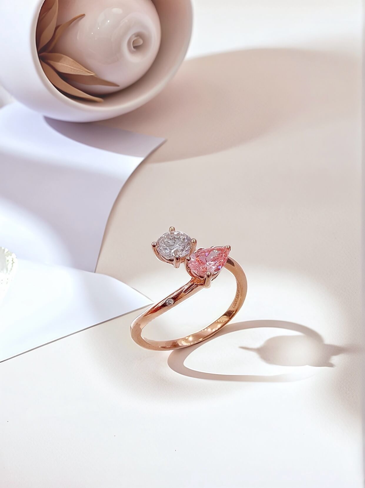 Pear cut lab grown pink diamond toi-et-moi engagement ring