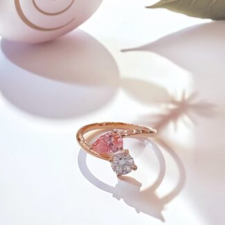Pear cut lab grown pink diamond toi-et-moi engagement ring