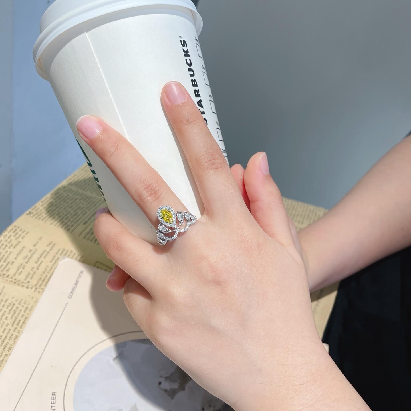 Pear cut lab grown yellow diamond engagement ring 01