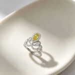 Pear cut lab grown yellow diamond engagement ring 01